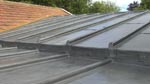 sloping lead to flat roof